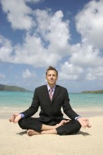 man-doing-yoga-in-business-suit-on-beach1.jpg