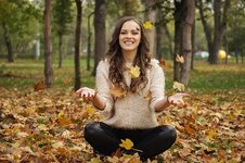 beautiful-girl-in-the-park-throwing-leaves-autumn-portrait-romantic-park-feeling-in-love-autumn.jpg
