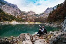 adventure-mountain-lake-alps-couple-daylight-environment-fir-trees-hike-hiking.jpg