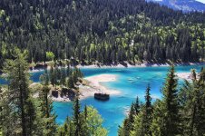 alpine-lake-blue-water-panorama-mountain-switzerland-lake-amazing-sunny.jpg