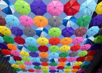 color-umbrella-red-yellow-blue-purple-blue-sky-decorative-street-budapest.jpg