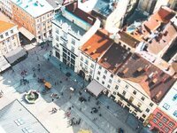urban-square-aerial-view-city-architecture-cityscape-town-people-buildings.jpg