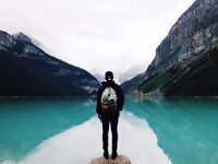 person-mountain-lake-reflection-turquoise-landscape-water-calm-male-man.jpg