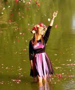 girl-blonde-wreath-water-petals-joy-nature.jpg