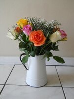 flowers-pretty-roses-greenery-bouquet-jug-white-floor-leaves.jpg