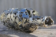 فنان يبدع بالقطع المعدنية والمفاتيح┊